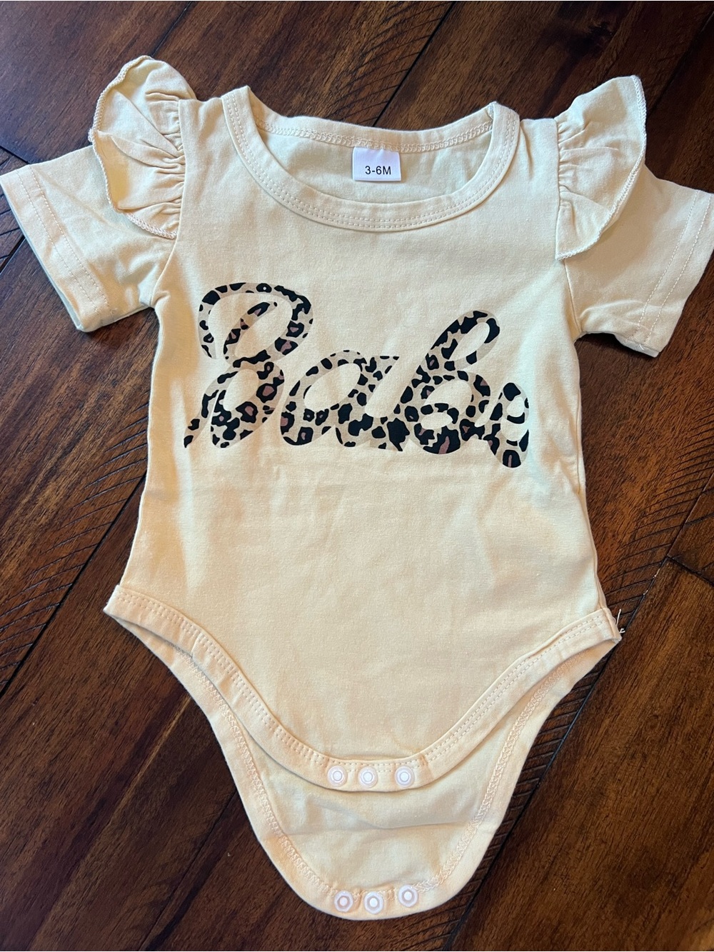 Cream 'Babe' Leopard Print Ruffle Sleeve Baby One-Piece
